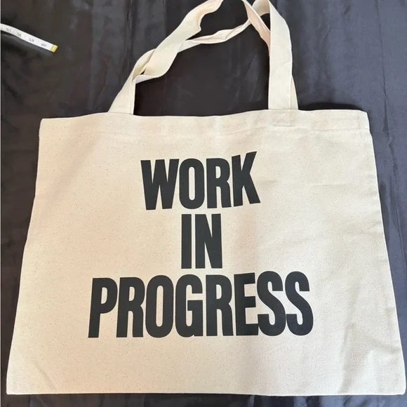 Gallery Dept Cream Tote with Yellow Logo / Black “work in progress” on other sid